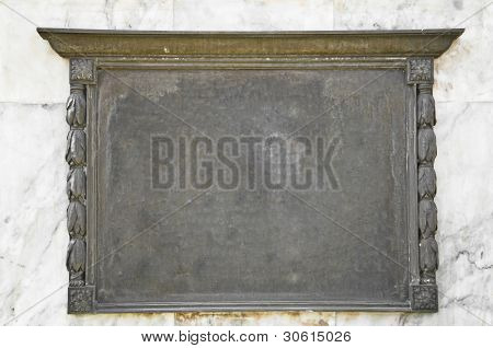Empty old bronze bulletin frame