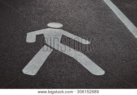 Grey Asphalt Road For Pedastrians, Market With Special Sign.