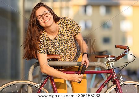 Girl With Bicycle  Lock. Bicycle U- Lock