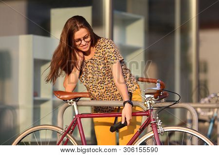 Girl With Bicycle  Lock. Bicycle U- Lock