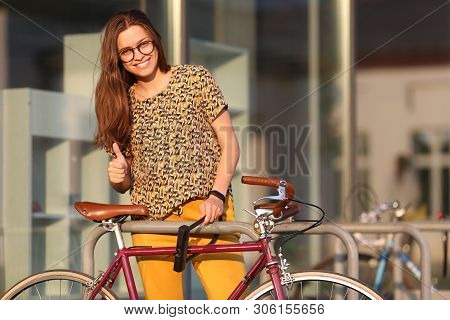 Girl With Bicycle  Lock. Bicycle U- Lock