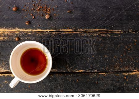 Empty Coffee Cup On Wooden Table With Space For Text. Composition For Coffee Shop And Coffee Making.