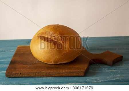 A Slice Of Bread. White Bread. Bread Wood. Bread On The Table. Bread For The Background. Bread For B