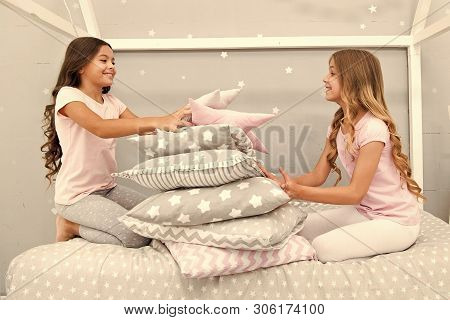 Girls Happy Best Friends In Pajamas With Pillows Sleepover Party. Soulmates Girls Having Fun Sleepov