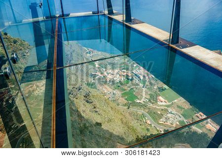Glass Skywalk Mirador De Abrante With View To Village Agulo, Atlantic Ocean And Teide In Tenerife, A