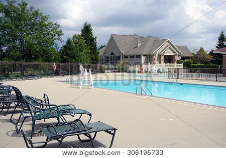 One May Swim In The Wesmere Country Club Swimming Pool, In Joliet, Illinois, During August.