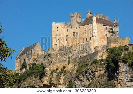 The Medieval Chateau De Beynac Rising On A Limestone Cliff Above The Dordogne River. France, Dordogn