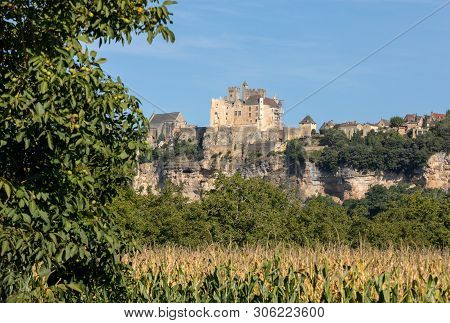 The Medieval Chateau De Beynac Rising On A Limestone Cliff Above The Dordogne River. France, Dordogn