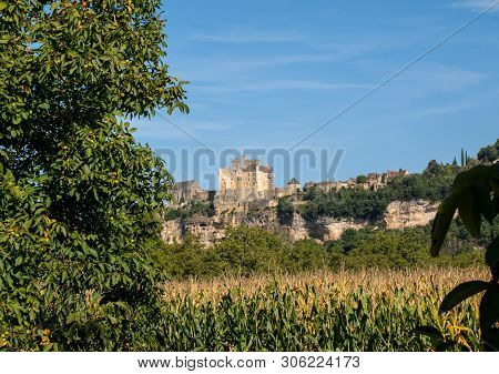The Medieval Chateau De Beynac Rising On A Limestone Cliff Above The Dordogne River. France, Dordogn