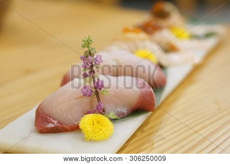 Hamachi Sushi (yellowtail Fish Or Amberjack Fish) Served With Wasabi And Ginger, Traditional Japanes