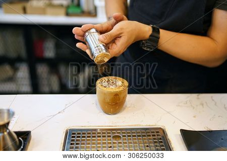 Hot Mocha - A Glass Of Coffee With Milk And Beautiful Latte Art, Topped With Chocolate Powder, Perfe