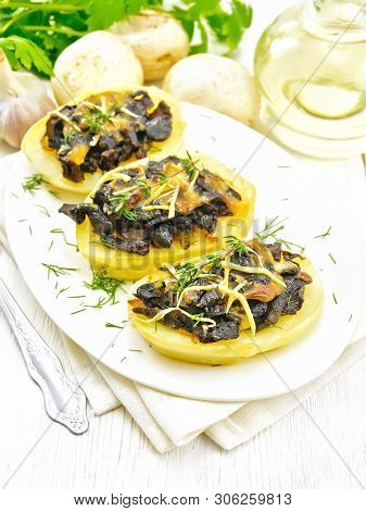 Potatoes Stuffed With Mushrooms On The Table