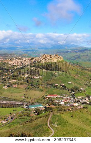 Beautiful Sicilian Village Calascibetta Photographed From Nearby Enna With Adjacent Mountains And Gr