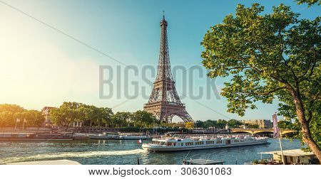 The Eifel Tower In Paris From A Tiny Street