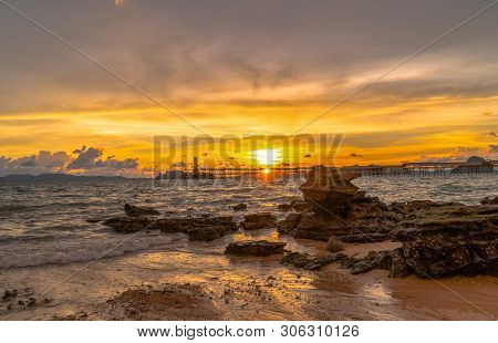 Sunset Above Industry Pier At Kwang Beach.there Have Beautiful Rock Along The Beach. Kwang Beach Is 