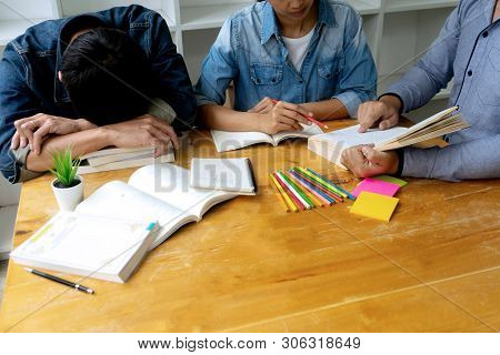 Woman And Man Work On The Table