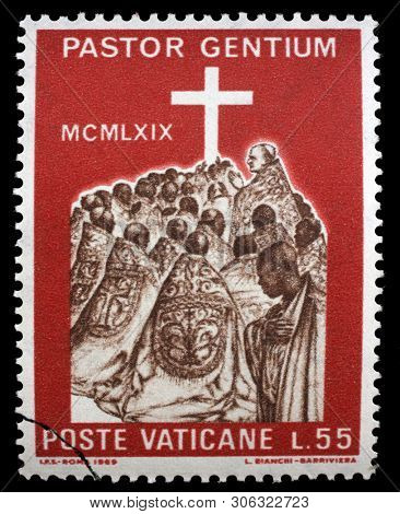 ZAGREB, CROATIA - JULY 03, 2014: A stamp issued in Vatican shows Visit of the Pope Paul VI to Africa, circa 1969.