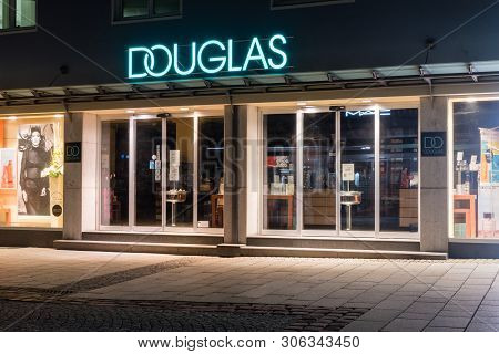 Bregenz, Austria - May 31, 2019: Entrance To Douglas At Night. Douglas Is An Internationally Operati