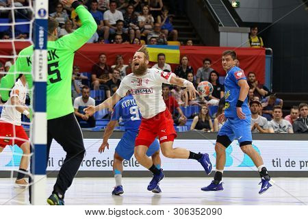 Kyiv, Ukraine - June 12, 2019: Nikolaj Oris Nielsen Of Denmark (in White) Attacks During The Ehf Eur