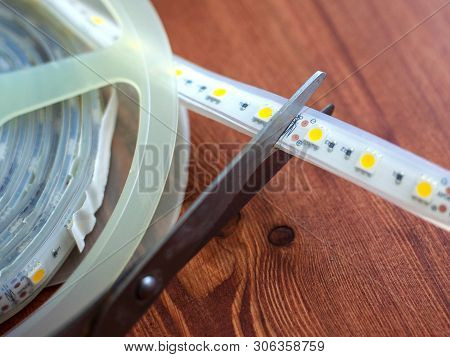 Trimming The Led Strip For Installation In Niches At Home Close-up