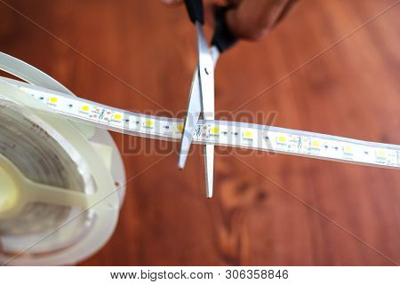 Trimming The Led Strip For Installation In Niches At Home Close-up