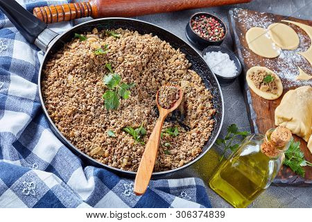 Ground Liver With Onion Fried In A Skillet, Ingredient Of Filling For Pierogies, Raw Dough And Uncoo