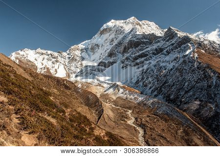 Huge Valley With River On Manaslu Circuit With View Of Snow Covered Mount Manaslu 8 156 Meters. Hima