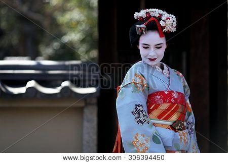 Japan, Kyoto, April, 05, 2017 - Beautiful Women In Maiko Kimono Dress At Old-fashioned Town Of Gion 