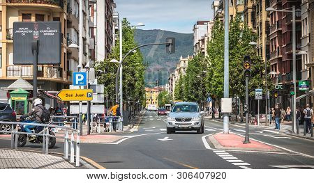 Car Driving On One Of The Main Street Of The City Of Irun, Spain