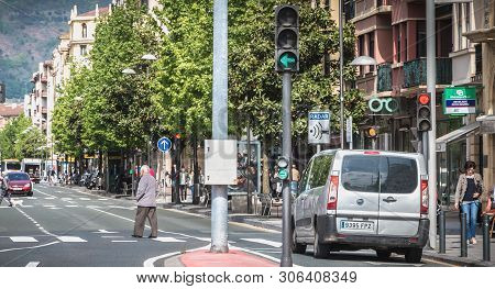 Car Driving On One Of The Main Street Of The City Of Irun, Spain