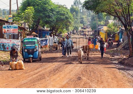 Demebecha, Ethiopia, April 20.2019, People Walking On The Ethiopian Street In The Morning. Demebecha