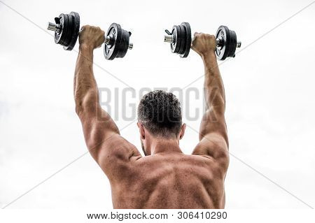 Happy And Sporty. Healthy Lifestyle. Muscular Back Man Exercising In Morning With Barbell. Athletic 