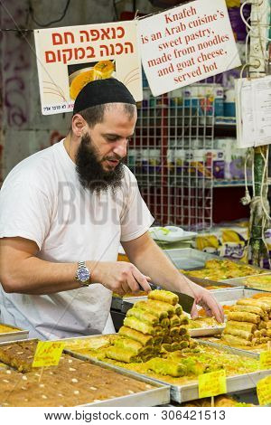 Tel Aviv , Israel - 21 November 2017: Sellers On The Old Grocery Street Nahalat-benjamin