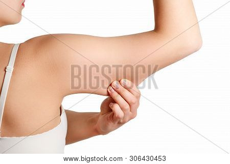 Beauty Portrait Woman Pinching Arm Fat Flabby Skin, Hand And Body Care. Smooth Skin