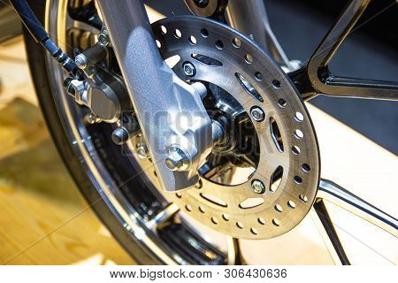 Close Up - Wheel Spokes And Brake Disc Of A Motorcycle