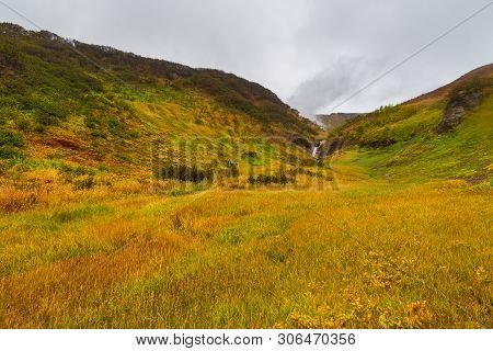 View Of The Eastern Mountain Covered By Clouds, Jelizevo District, Peninsula Kamchatka. Landscape In