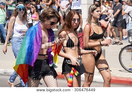 The Annual Parade Lgbt. Gay And Lesbians Walking In The Gay Pride Parade. Parade Of Tolerance. Rainb