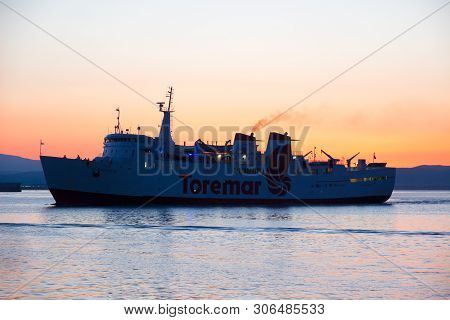 Portoferraio (li), Italy - August 09, 2016: Mv Marmorica Approaching The Port Of Piombino At Sunrise