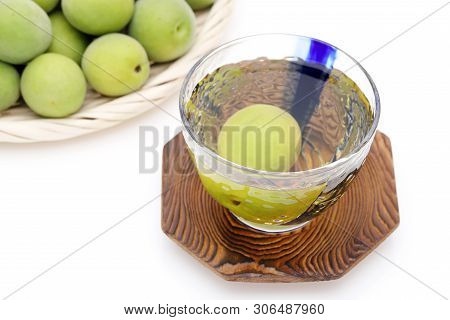 Japanese Plum Wine Called Umeshu On White Background