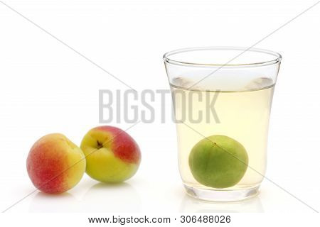 Japanese Plum Wine Called Umeshu On White Background