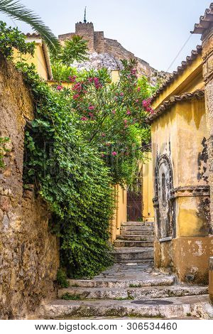 Scenic Narrow Street With Old Houses In Plaka District, Athens, Greece. Plaka Is One Of The Main Tou