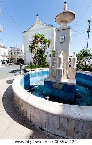 Alberobello / Italy - August 1, 2015:  Fountain Of Saint Lucia In Giangirolamo Ii Square. In The Anc
