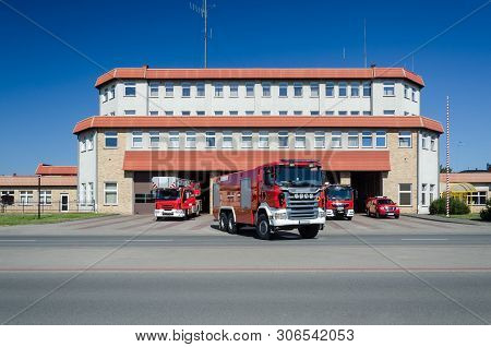Fire Department - A Heavy Rescue Vehicle Leaves The Fire Station For Action