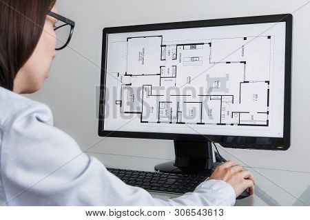 Los Angeles, California - June 3, 2019: Engineer, Constructor, Designer, Architect In Glasses Workin