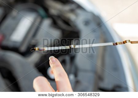 Car Dipstick For Oil Level Measurements. Checking The Parameters Of The Car Engine.