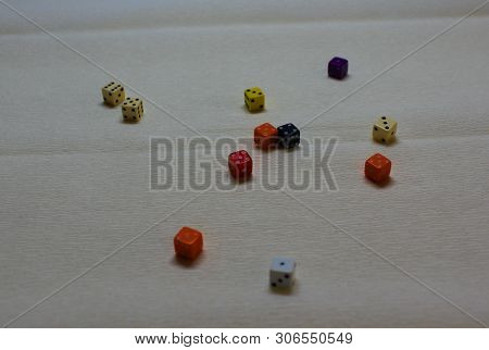 Colorful D6 Dice On A White Background With Faded Back