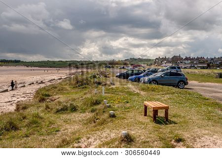 Alnmouth Beach And Car Park, Northumberland, England. 11 May 2019. Alnmouth Beach With Day Trippers 