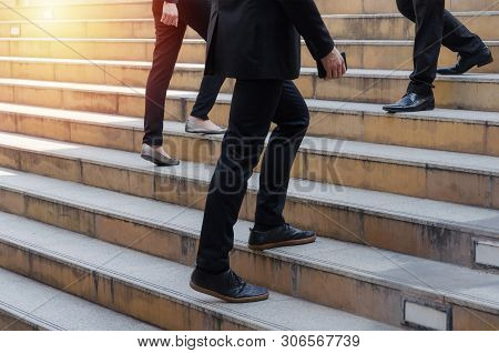 Group Of Young Business People Team Walking Fast Up And Down Stairs Going To Work Time At Morning In
