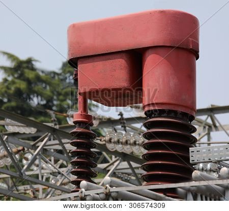 Red  Big Device Called Automatic Voltage Regulator To Change The Voltage Of The Transformer In Funct