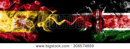 Spain Vs Kenya, Kenyan Smoky Mystic Flags Placed Side By Side. Thick Colored Silky Smokes Flag Of Sp